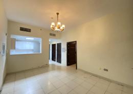 Empty Room image for: Apartment - 1 bedroom - 2 bathrooms for rent in Glitz 1 - Glitz - Dubai Studio City - Dubai, Image 1