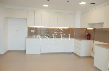 Kitchen image for: Apartment - 2 Bedrooms - 2 Bathrooms for sale in SAFI 2A - Town Square - Dubai, Image 1