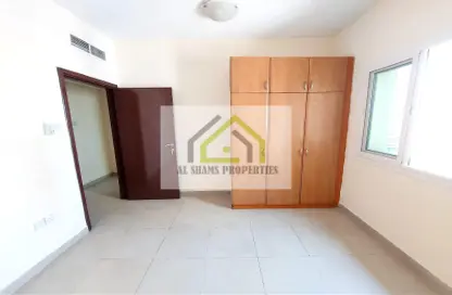 Room / Bedroom image for: Apartment - 1 Bedroom - 1 Bathroom for rent in Gulf Pearl Tower - Al Nahda - Sharjah, Image 1