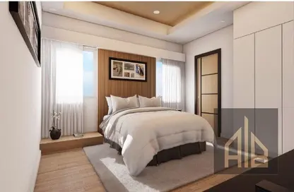 Room / Bedroom image for: Apartment - 1 Bathroom for sale in Garden Residences - Emirates City - Ajman, Image 1