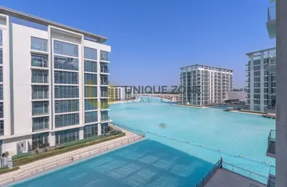 صورة لـ حوض سباحة شقة - 3 غرف نوم - 4 حمامات للايجار في ذا ريزيدنسز في ديستريكت ون - مدينة الشيخ محمد بن راشد - دبي ، صورة رقم 1