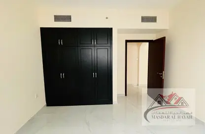 شقة - 2 غرف نوم - 2 حمامات للايجار في تجارية مويلح - الشارقة