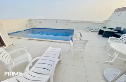 صورة لـ حوض سباحة شقة - غرفة نوم - 2 حمامات للايجار في هضبة الزعفرانة - منطقة المرور - أبوظبي ، صورة رقم 1