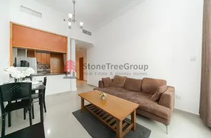 Living / Dining Room image for: Apartment - 1 Bedroom - 1 Bathroom for rent in Dream Tower - Dubai Marina - Dubai, Image 1