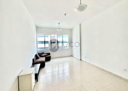 Living Room image for: Apartment - 1 bedroom - 2 bathrooms for rent in Olympic Park 3 - Olympic Park Towers - Dubai Sports City - Dubai, Image 1