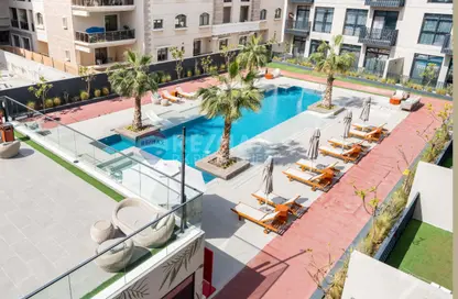 Pool image for: Apartment - 1 Bedroom - 2 Bathrooms for rent in Beverly Residence - Jumeirah Village Circle - Dubai, Image 1