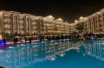 صورة لـ حوض سباحة شقة - 2 غرف نوم - 3 حمامات للايجار في ريسورتز بي دانوب - ارجان - دبي ، صورة رقم 1