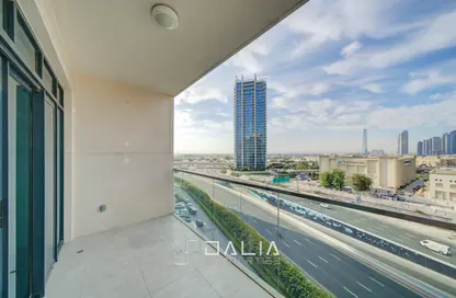 Balcony image for: Apartment - 1 Bedroom - 2 Bathrooms for rent in Vida Residence 1 - Vida Residence - The Hills - Dubai, Image 1