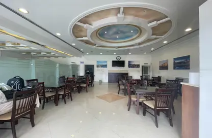 Living / Dining Room image for: Retail - Studio - 4 Bathrooms for rent in Al Nakheel - Ras Al Khaimah, Image 1