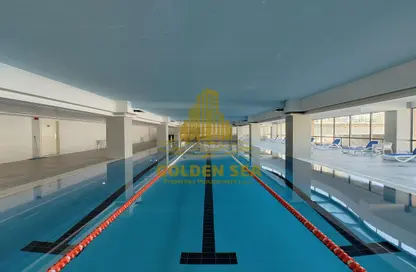 Pool image for: Apartment - 1 Bedroom - 2 Bathrooms for rent in Amwaj 1 Apartments - Al Raha Beach - Abu Dhabi, Image 1
