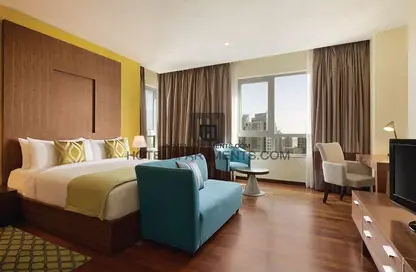 صورة لـ غرفة- غرفة النوم النزل و الشقق الفندقية - غرفة نوم - 1 حمام للايجار في ذا ريزيدنس 2 - برج ريزيدنس - دبي وسط المدينة - دبي ، صورة رقم 1