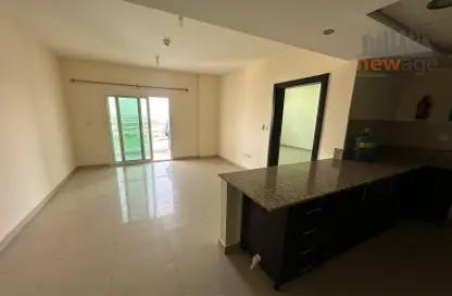 Kitchen image for: Apartment - 1 Bedroom - 2 Bathrooms for rent in Red Residency - Dubai Sports City - Dubai, Image 1
