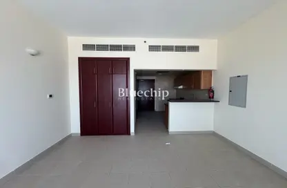 Apartment - Studio - 1 Bathroom for rent in Ice Hockey - Dubai Sports City - Dubai