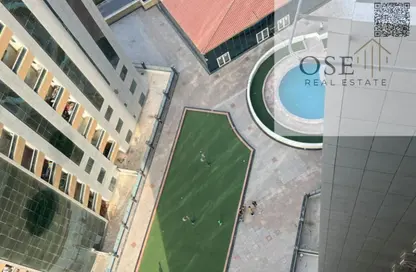 Apartment - 2 Bedrooms - 2 Bathrooms for sale in Orient Tower 2 - Orient Towers - Al Bustan - Ajman