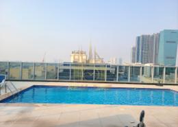 صورةحوض سباحة لـ: شقة - 1 غرفة نوم - 2 حمامات للكراء في بناية الزمردة - السطوة - دبي, صورة 1