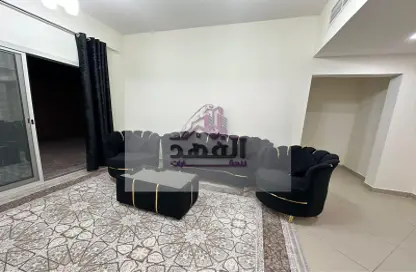 Living Room image for: Apartment - 1 Bedroom - 2 Bathrooms for rent in Sheikh Jaber Al Sabah Street - Al Naimiya - Al Nuaimiya - Ajman, Image 1