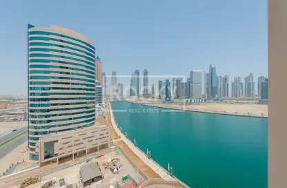 صورة لـ منظر مائي. مكتب - استوديو للبيع في برج الأعمال - الخليج التجاري - دبي ، صورة رقم 1