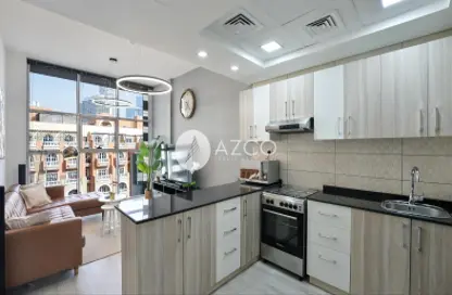 Apartment - 1 Bedroom - 2 Bathrooms for rent in Chaimaa Premiere - Jumeirah Village Circle - Dubai