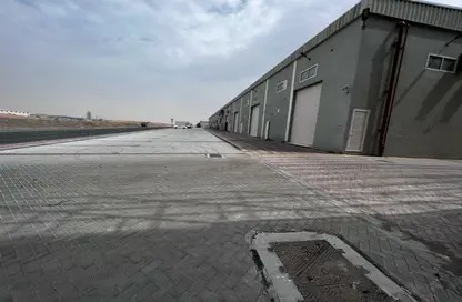 صورة لـ مبنى خارجي مستودع - استوديو - 7 حمامات للايجار في منطقة الإمارات الصناعية الحديثة - أم القيوين ، صورة رقم 1