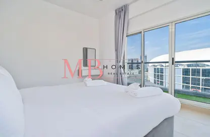 شقة - 2 غرف نوم - 2 حمامات للايجار في ستاديوم بوينت - مدينة دبي الرياضية - دبي