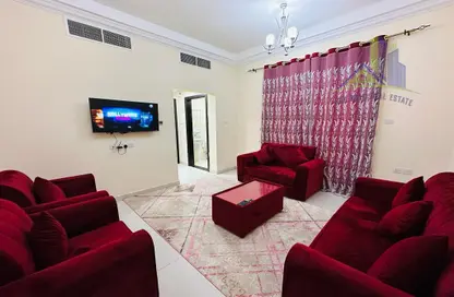Living Room image for: Apartment - 1 Bedroom - 2 Bathrooms for rent in Al Rawda 2 Villas - Al Rawda 2 - Al Rawda - Ajman, Image 1