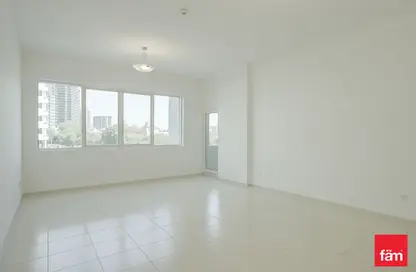 Empty Room image for: Apartment - 1 Bedroom - 2 Bathrooms for sale in Olympic Park 2 - Olympic Park Towers - Dubai Sports City - Dubai, Image 1
