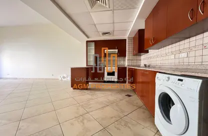 Kitchen image for: Apartment - 1 Bedroom - 2 Bathrooms for rent in Sherlock House 1 - Sherlock House - Motor City - Dubai, Image 1