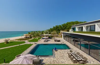 Pool image for: Villa - 6 Bedrooms - 7 Bathrooms for sale in Beachfront Seaside Estate - Beachfront Residence - Nurai Island - Abu Dhabi, Image 1