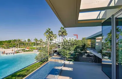 Pool image for: Villa - 5 Bedrooms - 7 Bathrooms for sale in Elysian Mansions - Tilal Al Ghaf - Dubai, Image 1