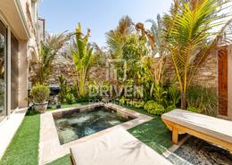 Garden image for: Townhouse - 2 bedrooms - 3 bathrooms for rent in Al Andalus Townhouses - Al Andalus - Jumeirah Golf Estates - Dubai, Image 1