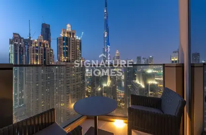 Balcony image for: Apartment - 3 Bedrooms - 4 Bathrooms for rent in Vida Residence Downtown - Downtown Dubai - Dubai, Image 1