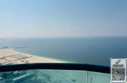 Apartment - 2 Bedrooms - 3 Bathrooms for sale in Corniche Tower - Ajman Corniche Road - Ajman