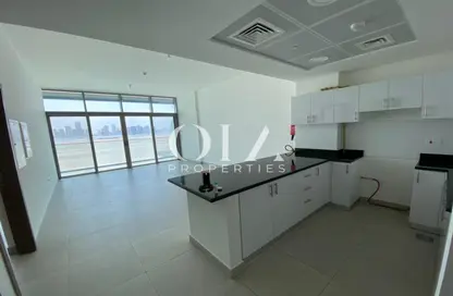 صورة لـ مطبخ شقة - غرفة نوم - 2 حمامات للبيع في سوهو سكوير - جزيرة السعديات - أبوظبي ، صورة رقم 1