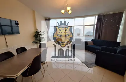 شقة - غرفة نوم - 2 حمامات للايجار في أورينت تاور 1 - أورينت تاور - البستان - عجمان