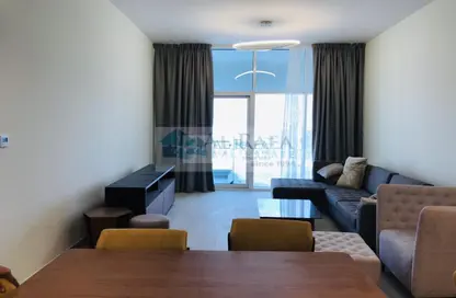 Living / Dining Room image for: Apartment - 1 Bedroom - 2 Bathrooms for rent in Azizi Aliyah - Dubai Healthcare City - Dubai, Image 1