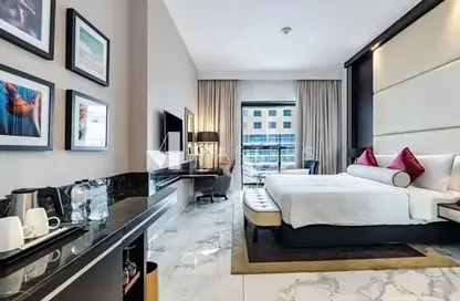 Room / Bedroom image for: Apartment - 1 Bathroom for sale in TFG Marina Hotel - Dubai Marina - Dubai, Image 1