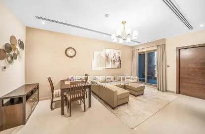Living / Dining Room image for: Apartment - 1 Bedroom - 2 Bathrooms for rent in Elite Downtown Residence - Downtown Dubai - Dubai, Image 1