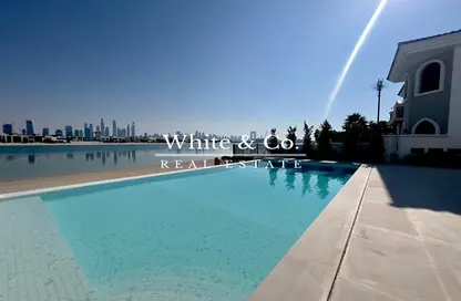 Pool image for: Villa - 5 Bedrooms - 6 Bathrooms for rent in Garden Homes Frond M - Garden Homes - Palm Jumeirah - Dubai, Image 1