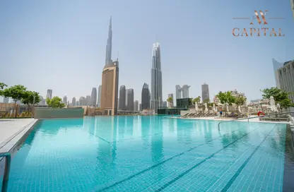Pool image for: Apartment - 1 Bedroom - 1 Bathroom for rent in Downtown Views II Tower 3 - Downtown Views II - Downtown Dubai - Dubai, Image 1