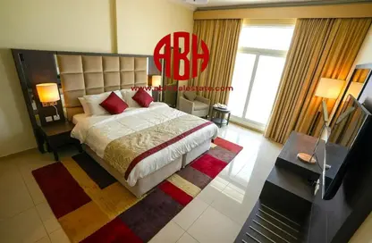 Room / Bedroom image for: Apartment - 3 Bedrooms - 3 Bathrooms for sale in Siraj Tower - Arjan - Dubai, Image 1