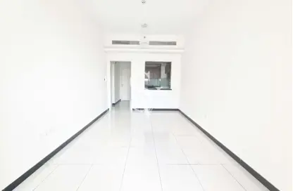 Empty Room image for: Apartment - 1 Bedroom - 2 Bathrooms for sale in Crystal Residence - Jumeirah Village Circle - Dubai, Image 1