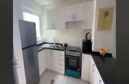 Kitchen image for: Townhouse - 3 Bedrooms - 3 Bathrooms for rent in Mimosa - Damac Hills 2 - Dubai, Image 1