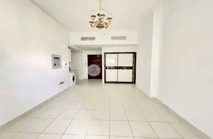 Empty Room image for: Apartment - 1 Bathroom for sale in Glitz 1 - Glitz - Dubai Studio City - Dubai, Image 1