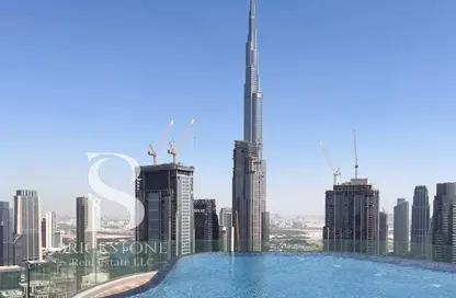Pool image for: Apartment - 1 Bathroom for sale in Paramount Tower Hotel  and  Residences - Business Bay - Dubai, Image 1