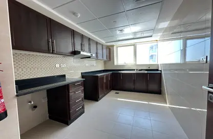 Kitchen image for: Apartment - 1 Bedroom - 2 Bathrooms for rent in C2302 - Khalifa City A - Khalifa City - Abu Dhabi, Image 1