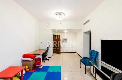 Living Room image for: Apartment - 2 Bedrooms - 2 Bathrooms for sale in Indigo Spectrum 2 - Indigo Towers - International City - Dubai, Image 1