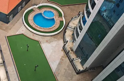 Apartment - 2 Bedrooms - 2 Bathrooms for sale in Orient Tower 1 - Orient Towers - Al Bustan - Ajman