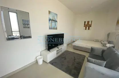 Living Room image for: Apartment - 1 Bathroom for sale in Afnan 4 - Midtown - Dubai Production City (IMPZ) - Dubai, Image 1