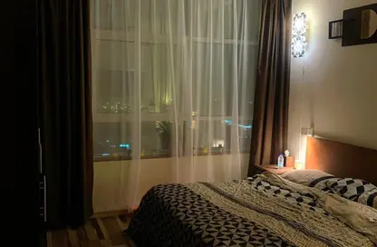شقة - 2 غرف نوم - 2 حمامات للايجار في أورينت تاور 1 - أورينت تاور - البستان - عجمان