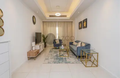 Living Room image for: Apartment - 2 Bedrooms - 3 Bathrooms for sale in Vincitore Palacio - Arjan - Dubai, Image 1